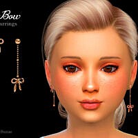 Bow Child Earrings By Suzue